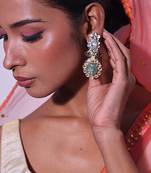 Green gold plated kundan earrings