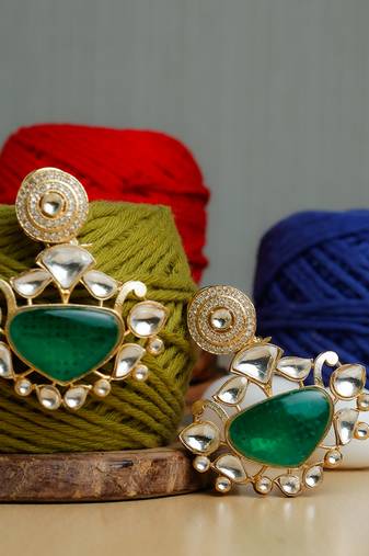 Green stone gold plated earrings