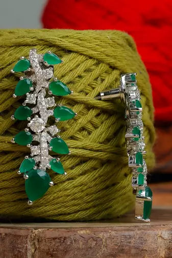 Green stone gold plated earrings