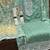 Elegant mint green embroidered cotton suit with pastel ombre organza dupatta