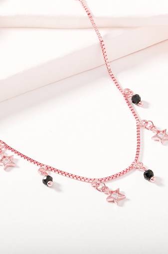 Star charm bracelet with black beads