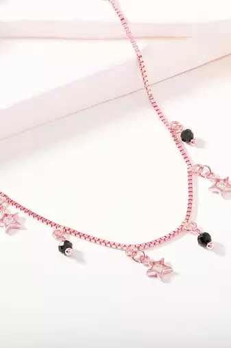 Star charm bracelet with black beads