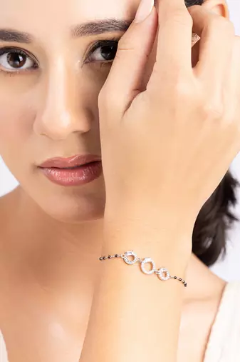 Three-stone black beads bracelet