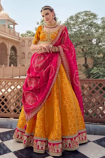 ORANGE ELEPHANT BOARDER BEADS WORK LEHENGA FOR WEDDING
