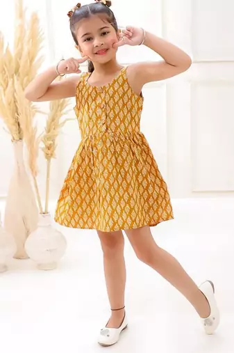 Yellow cotton printed frocks for girls