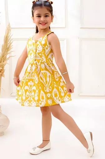 Yellow cotton printed frocks for girls