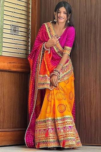 pink & yellow bandhani silk saree with embroidered border