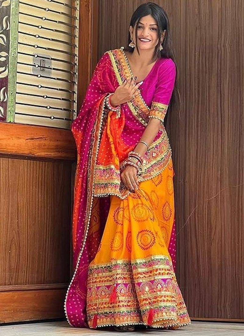 pink & yellow bandhani silk saree with embroidered border