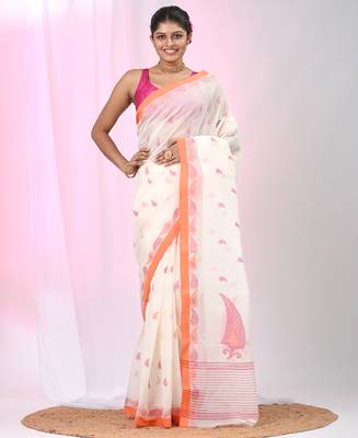 Elegant off white tant saree with leaf borders 1