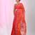 Vibrant orange tant saree with leaf borders
