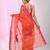 Vibrant orange tant saree with leaf borders