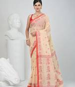 Elegant cream & red handwoven tant cotton saree with floral motifs