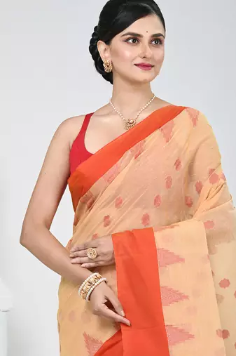 Elegant beige & red handwoven tant cotton saree with traditional motifs