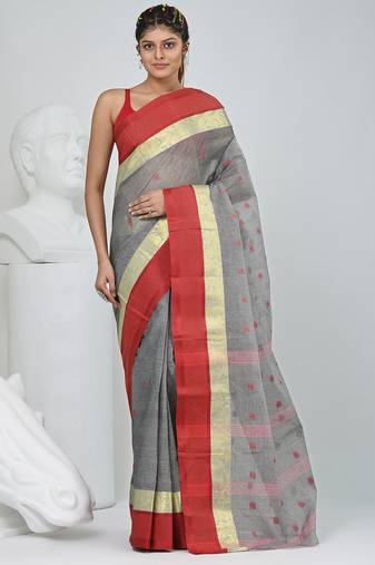 Stylish grey tant saree with red and gold border