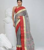 Stylish grey tant saree with red and gold border