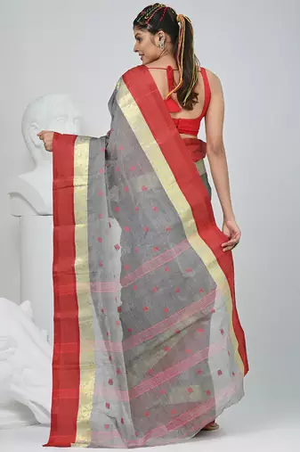Stylish grey tant saree with red and gold border