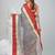 Stylish grey tant saree with red and gold border