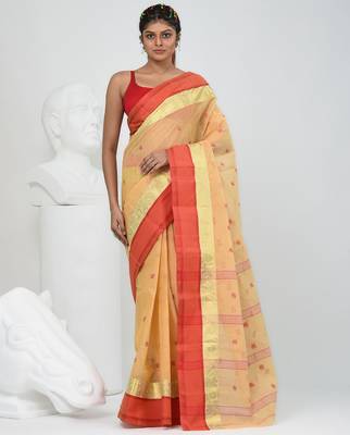 Stylish beige tant saree with red and gold border 1