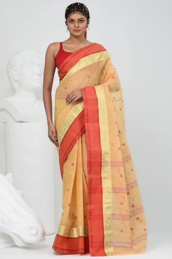 Stylish beige tant saree with red and gold border