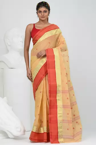 Stylish beige tant saree with red and gold border