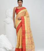 Stylish beige tant saree with red and gold border