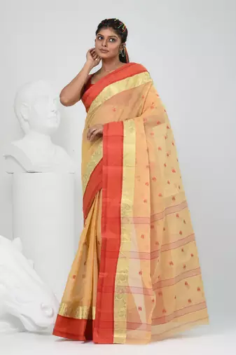 Stylish beige tant saree with red and gold border