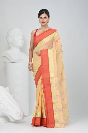 Stylish beige tant saree with red and gold border
