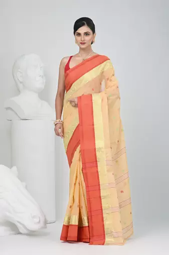 Stylish beige tant saree with red and gold border