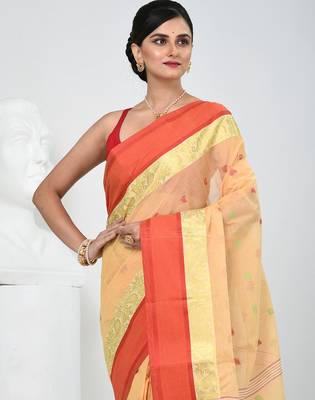Stylish beige tant saree with red and gold border 2