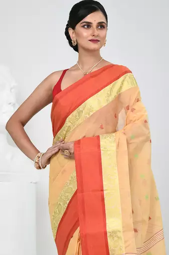 Stylish beige tant saree with red and gold border
