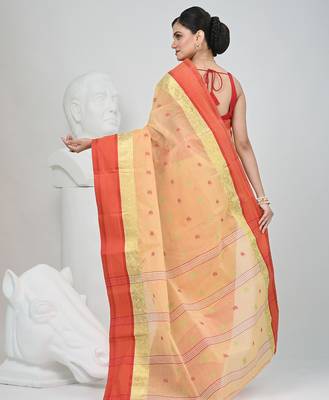 Stylish beige tant saree with red and gold border 4