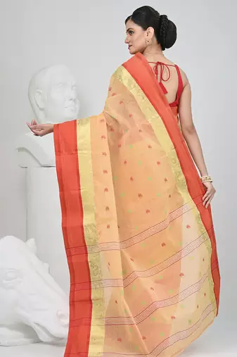 Stylish beige tant saree with red and gold border