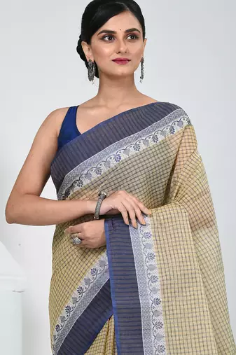 Elegant checked tant saree in beige and blue with intricate borders