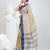Elegant checked tant saree in beige and blue with intricate borders