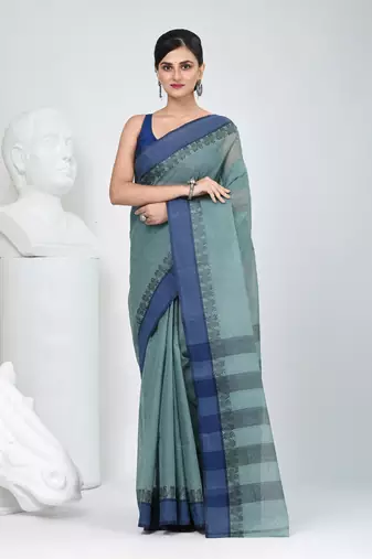 Elegant teal and navy blue striped tant saree with floral border