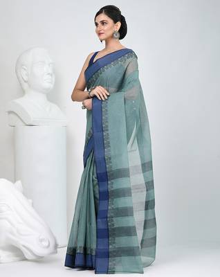Elegant teal and navy blue striped tant saree with floral border 3