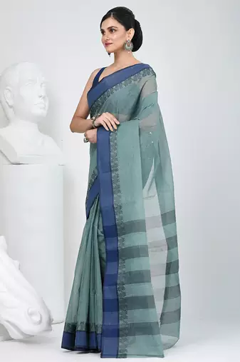 Elegant teal and navy blue striped tant saree with floral border