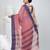 Elegant blush pink and navy blue striped tant saree with floral border