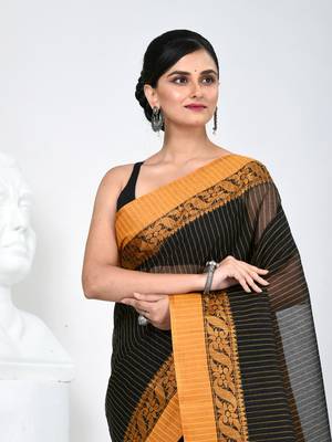 Classic black and mustard striped tant saree with intricate borders 2