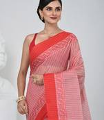 Elegant red and white checked tant saree with floral lace border