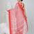 Elegant red and white checked tant saree with floral lace border