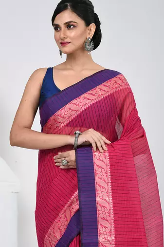 Classic rani pink and blue striped tant saree with intricate borders