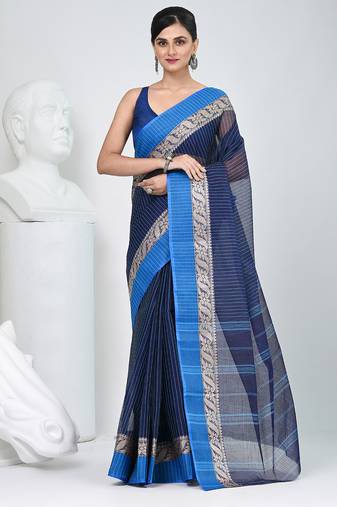Stunning navy blue and blue striped tant saree with floral lace border