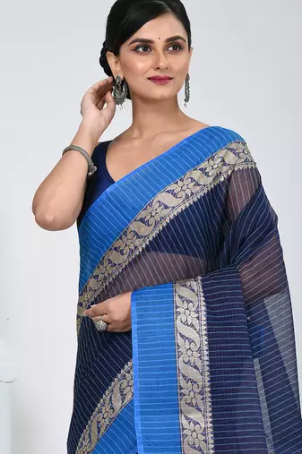 Stunning navy blue and blue striped tant saree with floral lace border
