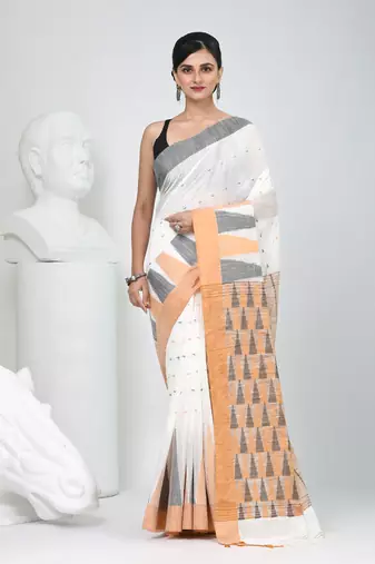 Off white handspun cotton saree with geometric motif and bright hues