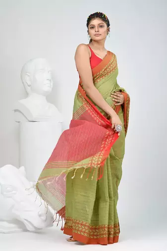 Green and red handspun cotton saree with vibrant borders
