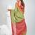 Green and red handspun cotton saree with vibrant borders