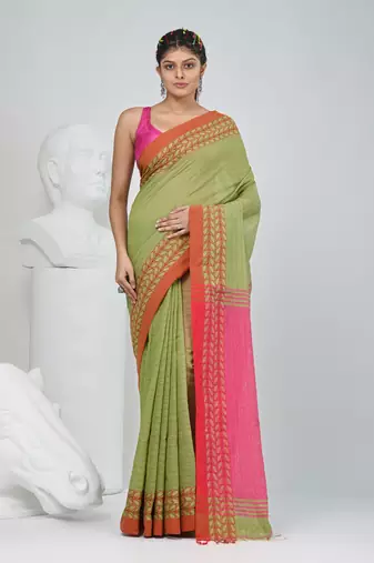 Green and pink handspun cotton saree with vibrant borders