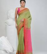Green and pink handspun cotton saree with vibrant borders