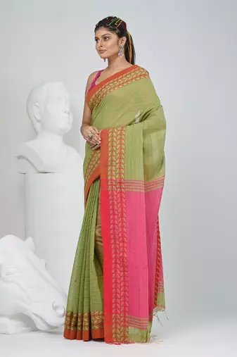 Green and pink handspun cotton saree with vibrant borders